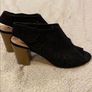 Used high heels low cut with strap back.